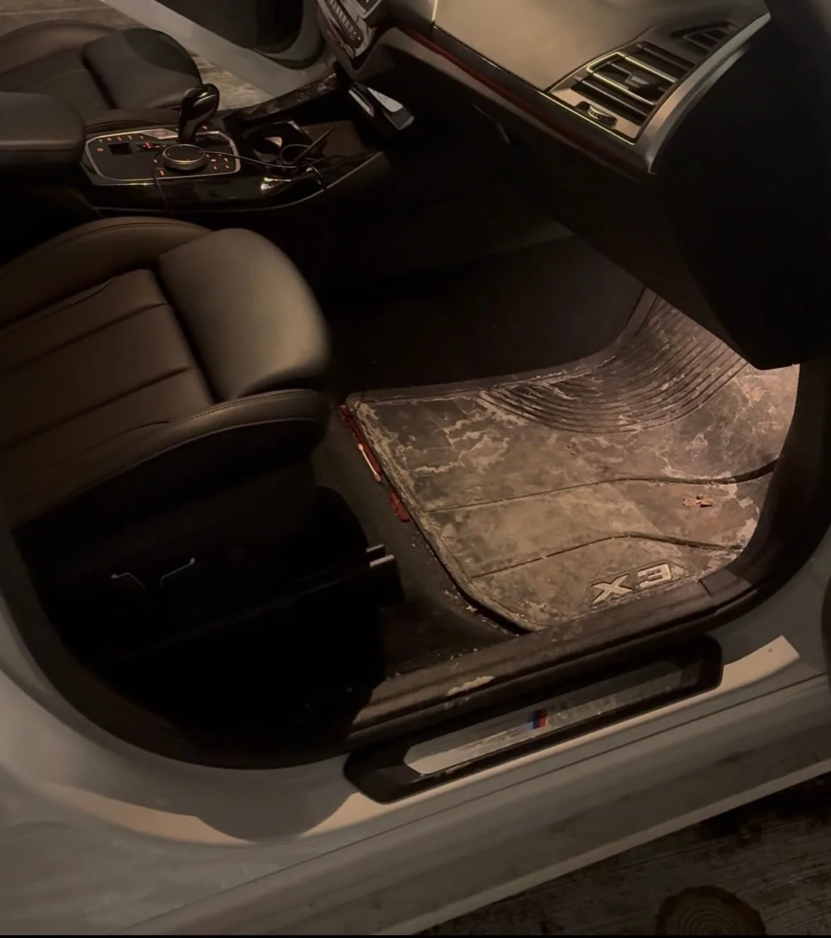 Vehicle interior seat area before detailed cleaning