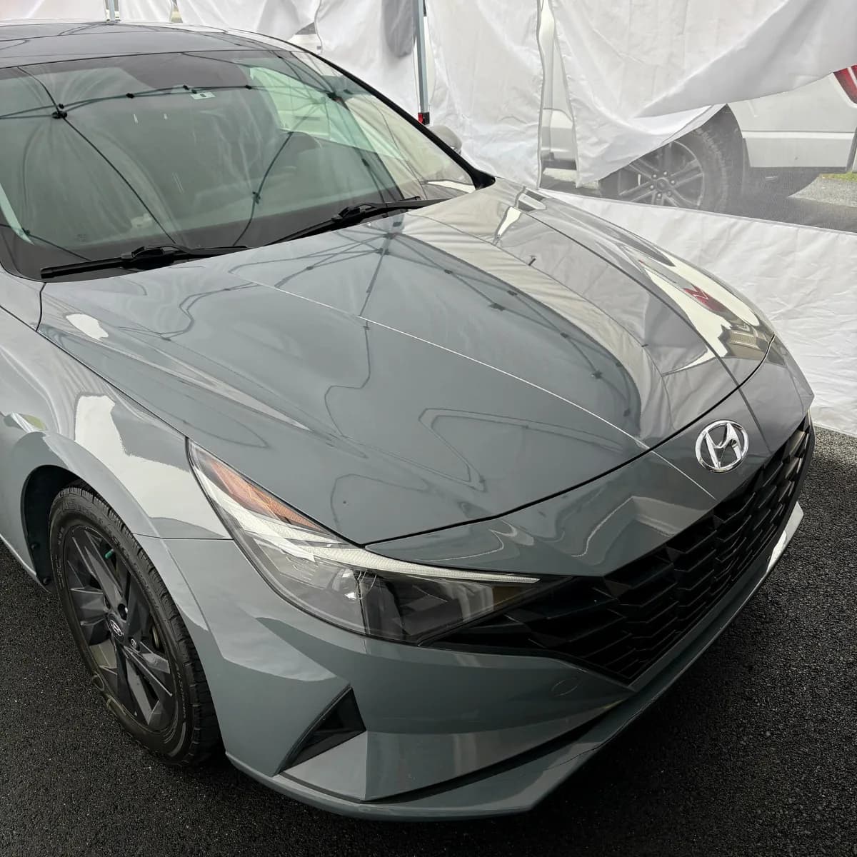 Hyundai Elantra after ceramic coating prep under WCAP Detailing canopy coverage